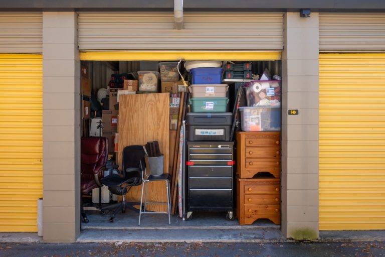 Self storage unit filled with household items